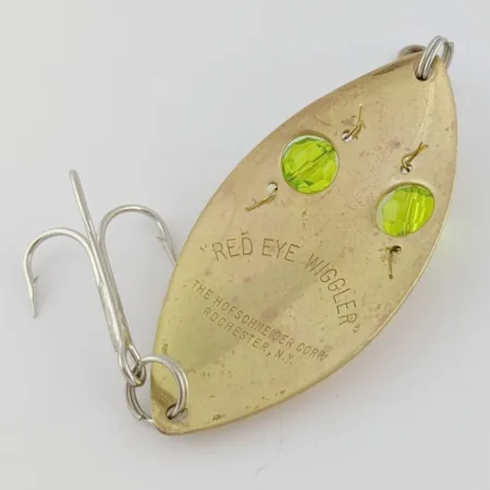 Hofschneider Red Eye Wiggler, gold/green, 25, блесна коливалка (колебалка) #24288