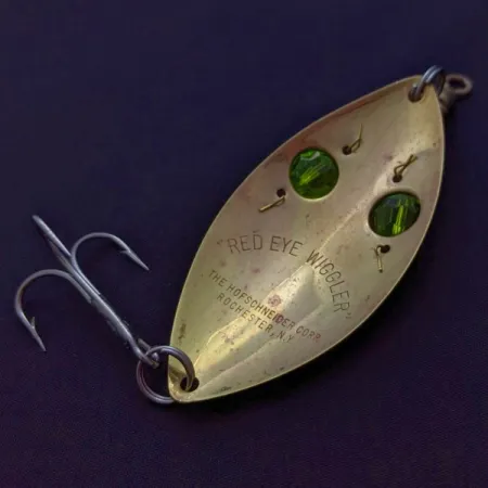 Hofschneider Red Eye Wiggler, gold/green, 25, блесна коливалка (колебалка) #24288