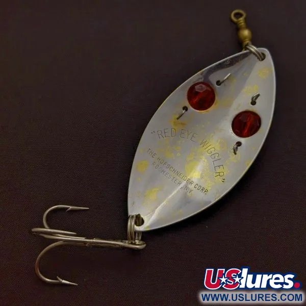  Hofschneider Red Eye Wiggler, срібло/латунь/червоні очі, 25, блесна коливалка (колебалка) #24361