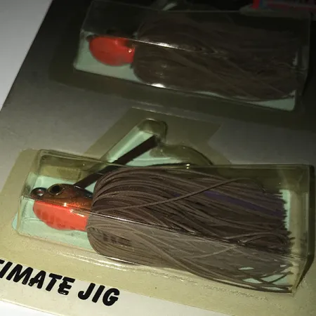 Other DUH Ultimate Jig джиг-незачіпляйка UV (світиться в ультрафіолеті), коричневий/червоний, 12 г, до рибалки #6294